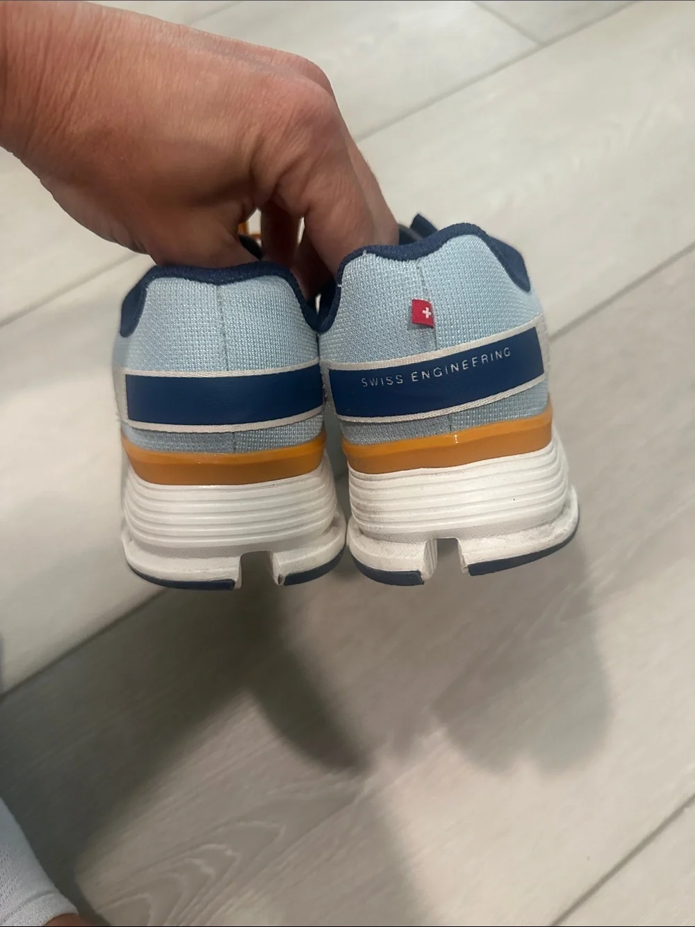 On Lightweight Women's Running Shoes in Light Blue and Orange